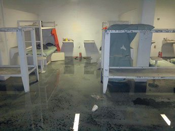 Smoke and water damage can be seen in a McKinley County Adult Detention Center pod after inmates set fire to the jail early Saturday. Courtesy Photo